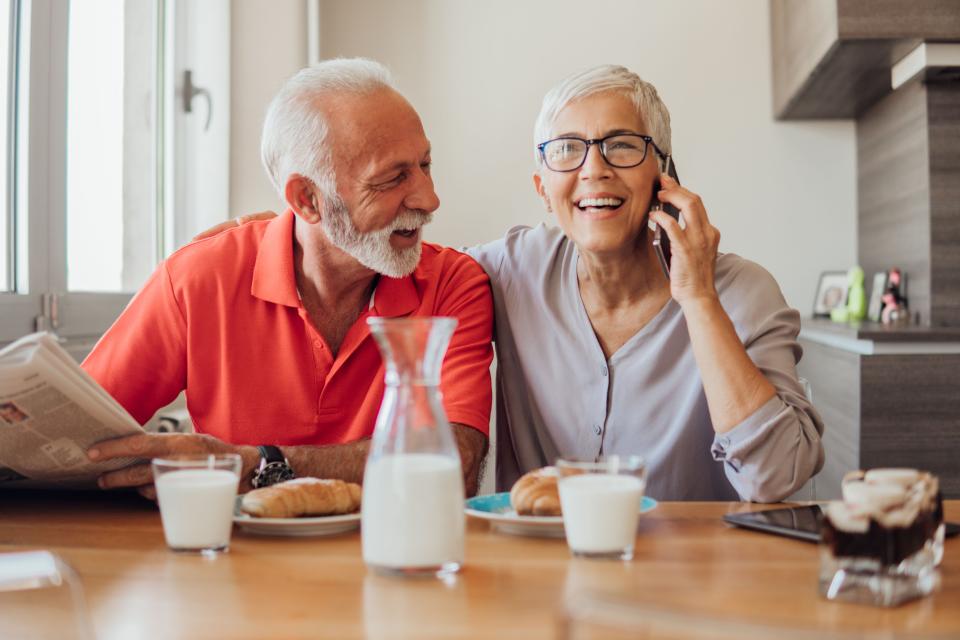 Older couple sitting in a kitchen