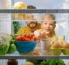 dad and child peaking into fridge
